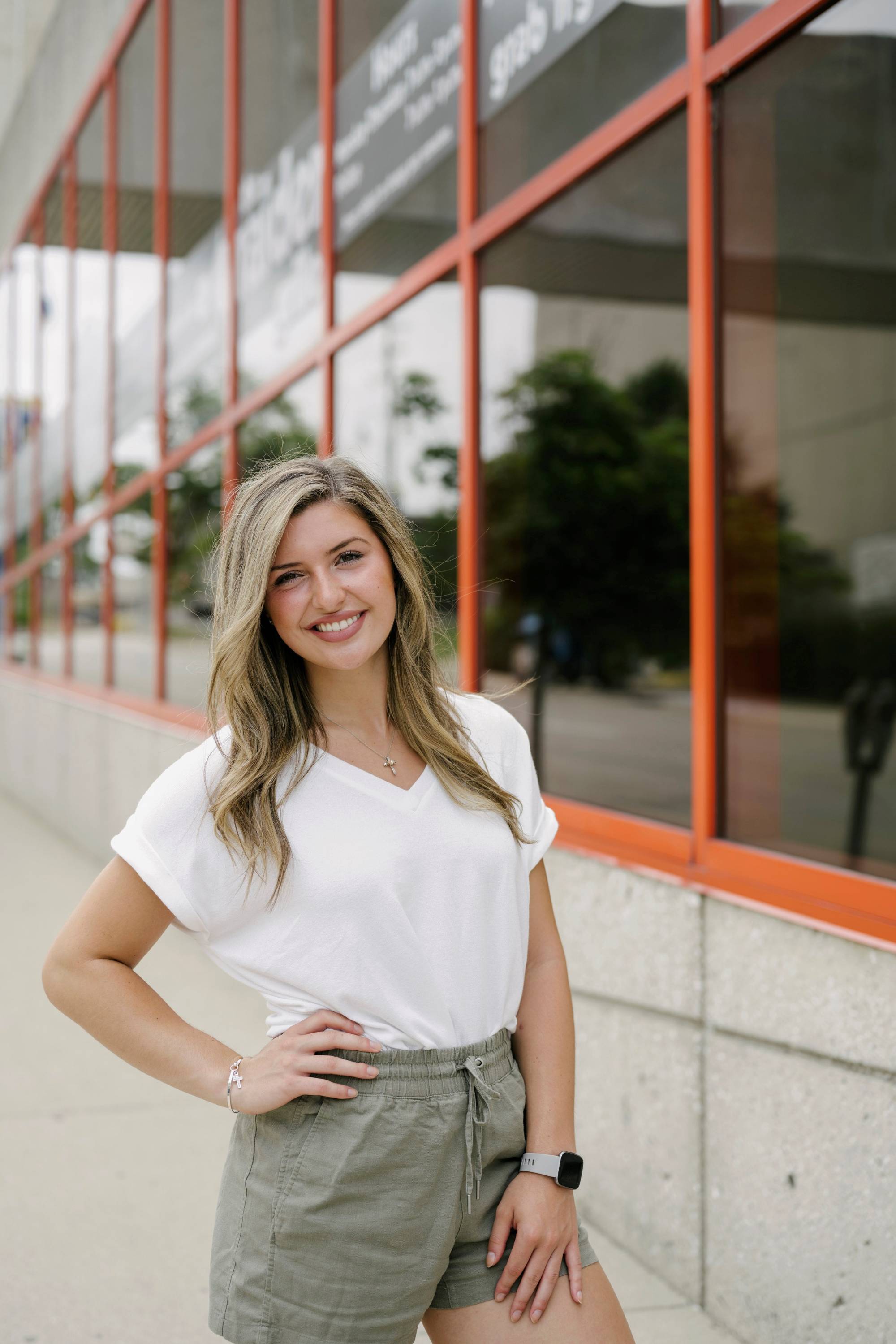 Image of Hailey standing by a window